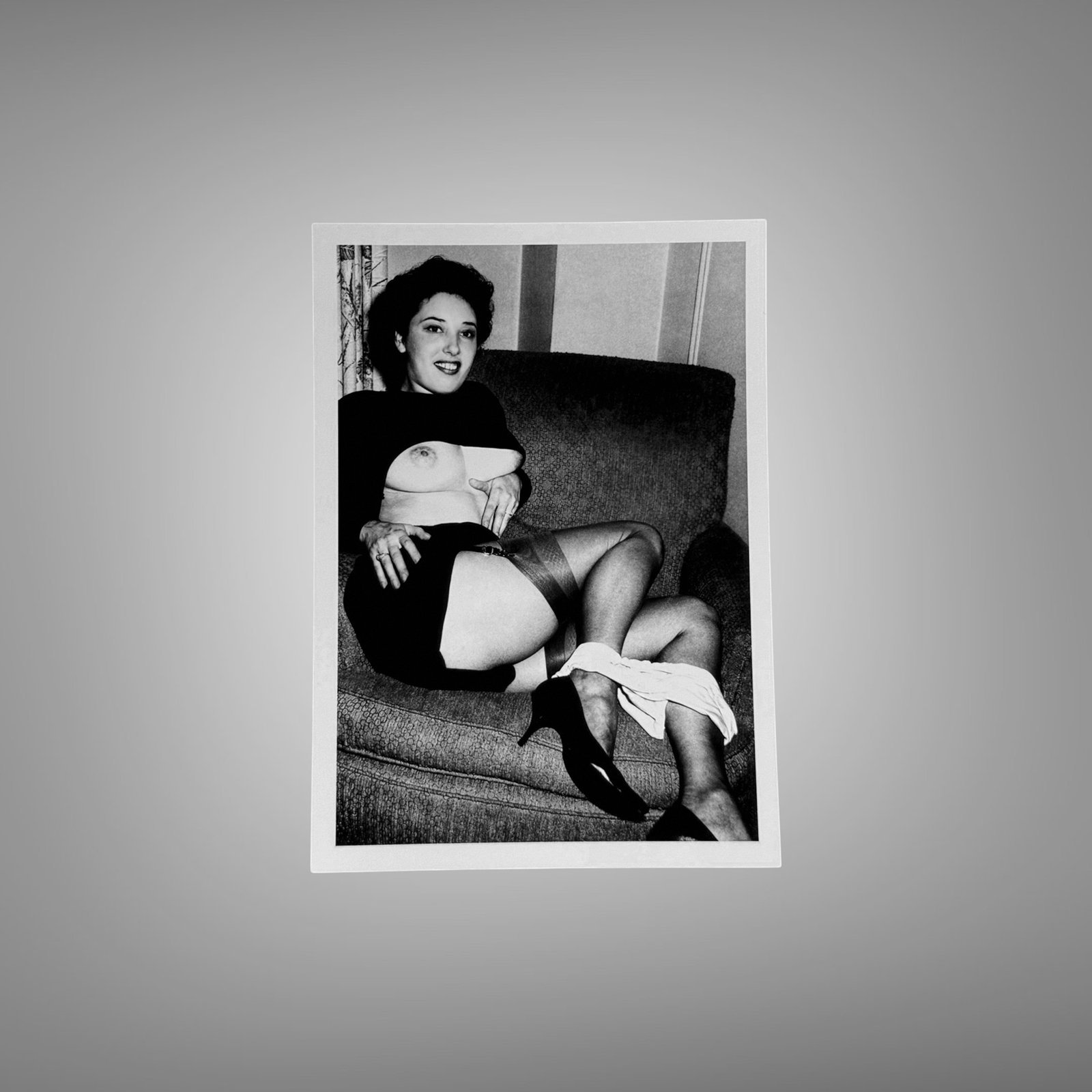 Pin-Up & Glamour Sofa Pin-Up Pose with Stockings and a Soft Studio Smile 5x7 Photo Print
