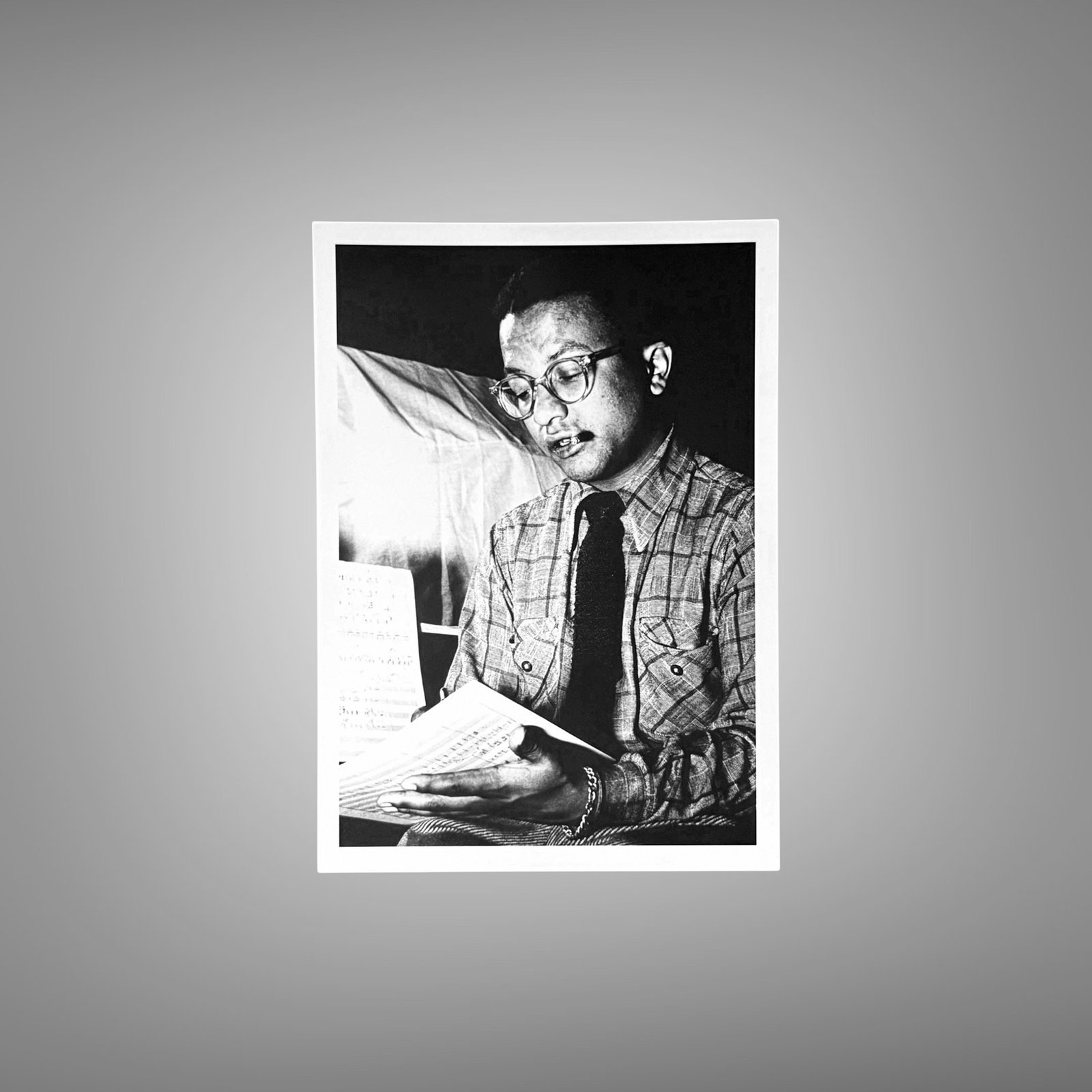 Music & Culture Bespectacled Musician Reading in a Backstage or Studio Moment 5x7 Photo Print