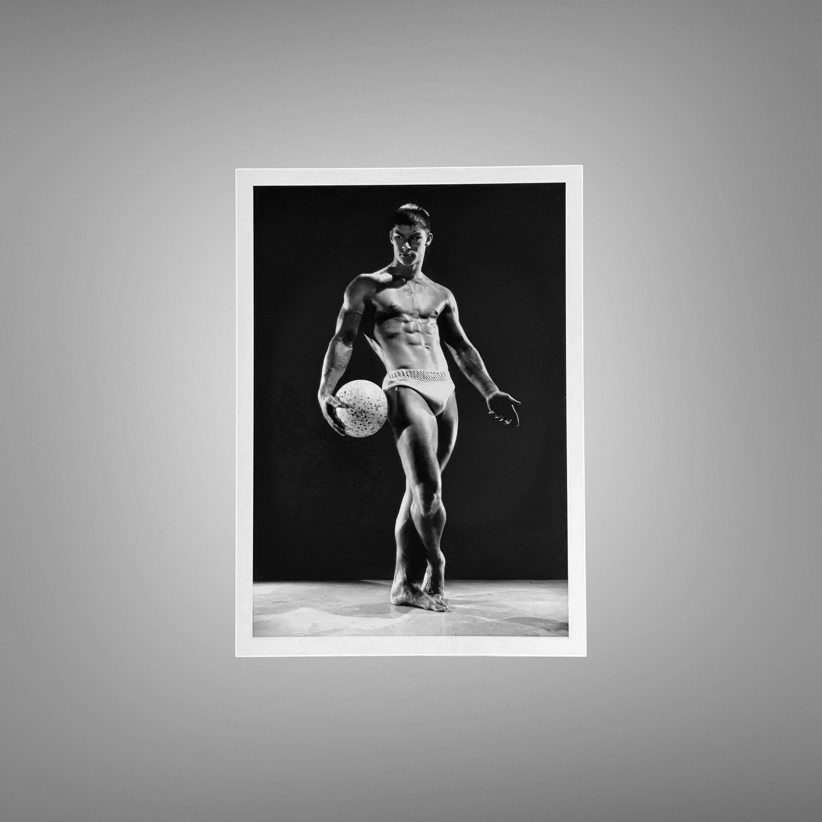 Male Physique an Athletic Knee Rest Studio Pose with Sculptural Posture and Athletic Studio Styling 5x7 Photo Print